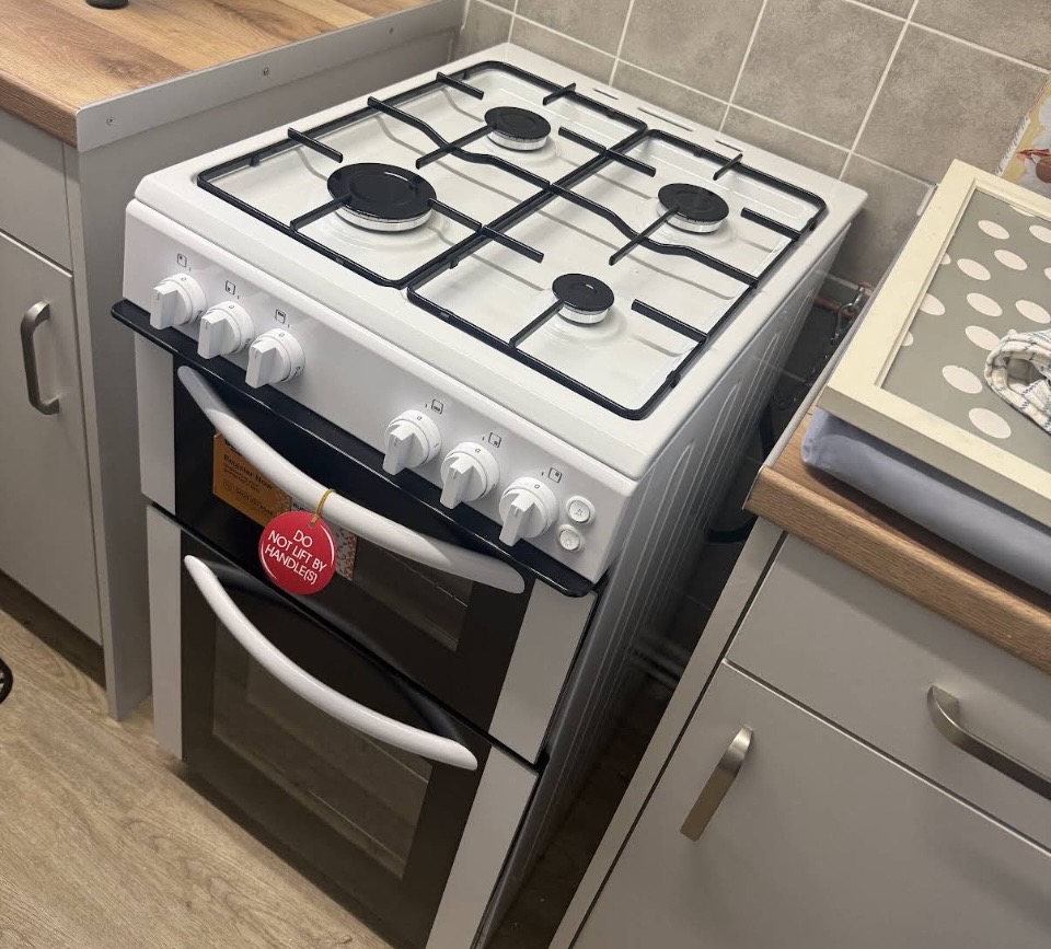 Freestanding gas cooker installed and connected by a Gas Safe registered engineer in Manchester.